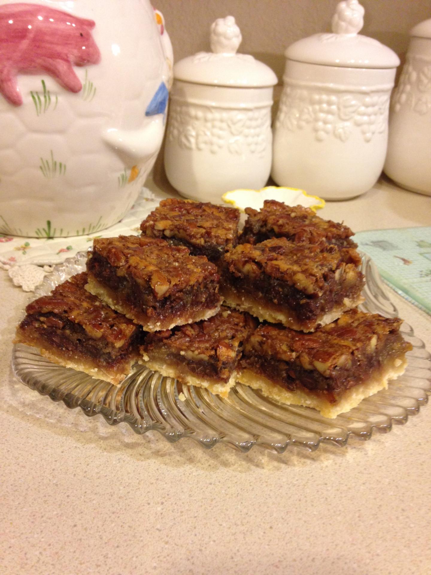 It’s Bourbon Appreciation Month! A great time to post a recipe share
with my Aunt B! Bourbon Pecan Bars…yum huh!